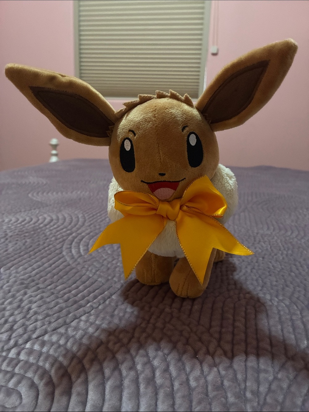 Holiday Eevee Plush with large yellow bow - Pokémon